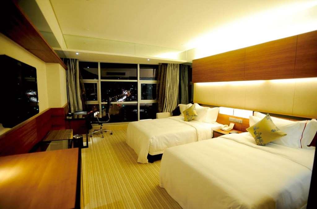 Grand View Hotel Tientsin Oda fotoğraf